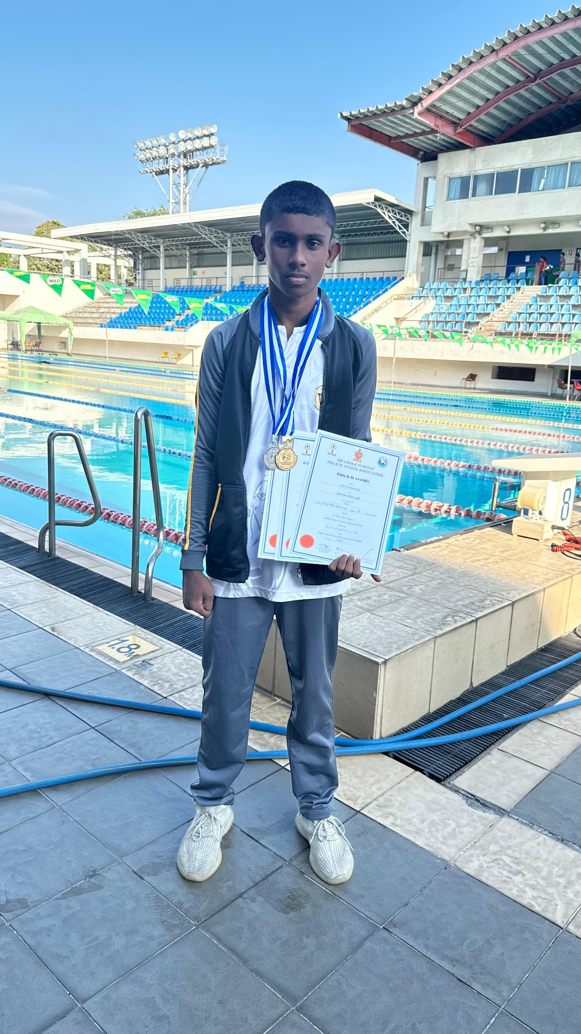Swimming in galle.butterfly swimming academy galle.national age group swimmer.